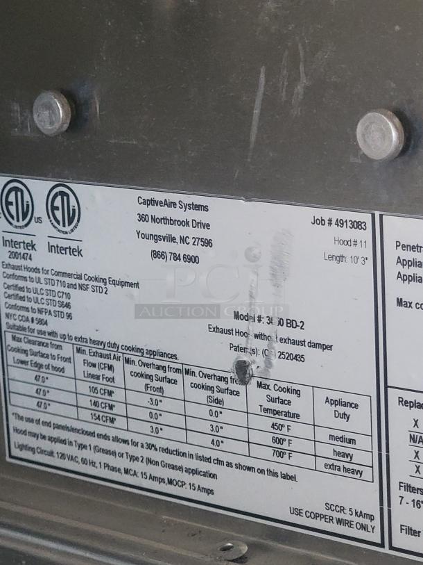 CaptiveAire Systems label on a Texino FD-306 mobile kitchen. Lists air flow, cooking temperatures, and installation details.
