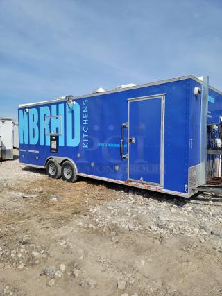 2020 Diamond Cargo 24' mobile kitchen trailer, blue exterior, dual axles, featuring commercial-grade kitchen equipment.