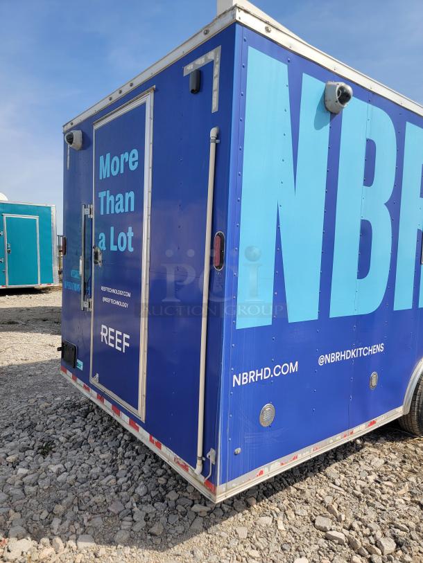 2020 Diamond Cargo 24' mobile kitchen, blue exterior with "More Than a Lot" text, equipped with commercial-grade appliances.