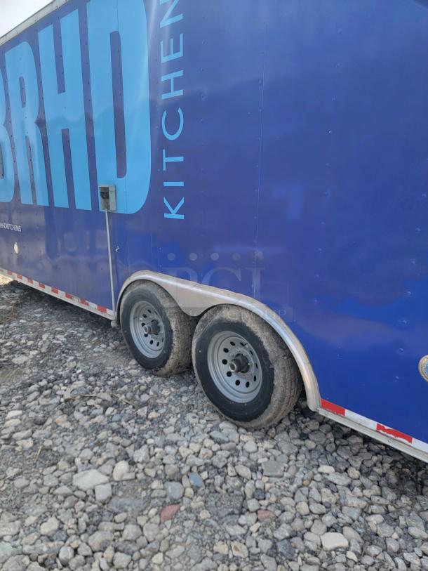 2020 Diamond Cargo 24' mobile kitchen trailer, blue exterior, dual axles, for high-volume commercial use.