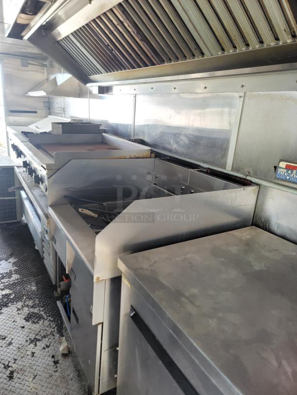 2020 Diamond Cargo 24' mobile kitchen with Arctic Air fridge/freezer, Wells griddle/range, and True prep station. Sturdy 14,000 LB GVWR chassis.