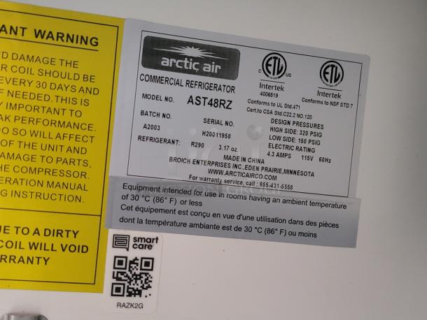 Label showing Arctic Air commercial refrigerator model AST48RZ, serial H20011958, design pressure details.