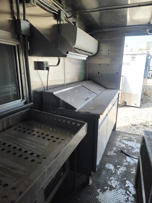 2020 Diamond Cargo 8.5 x 24 TA mobile kitchen with Arctic Air fridge/freezer, Wells griddle, and True prep station.