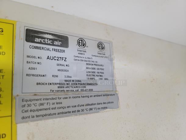Arctic Air commercial freezer label showing model AUC27FZ, batch A2001, serial H9202824, made in China.