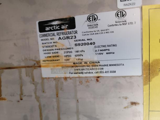 Arctic Air commercial refrigerator label showing Model AGR23, serial S920040, electric rating 2.7 AMPS, 115V, 60Hz.