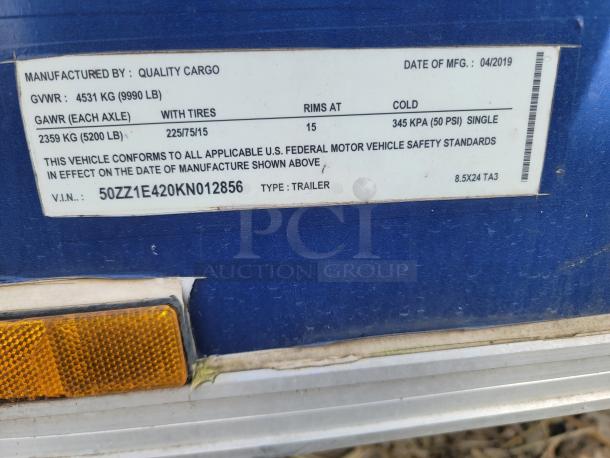 Label on 24' mobile ghost kitchen trailer, shows GVWR 9,990 LB, model 8.5x24 TA3, VIN 50ZZ1E420KN012856, manufactured in 04/2019.