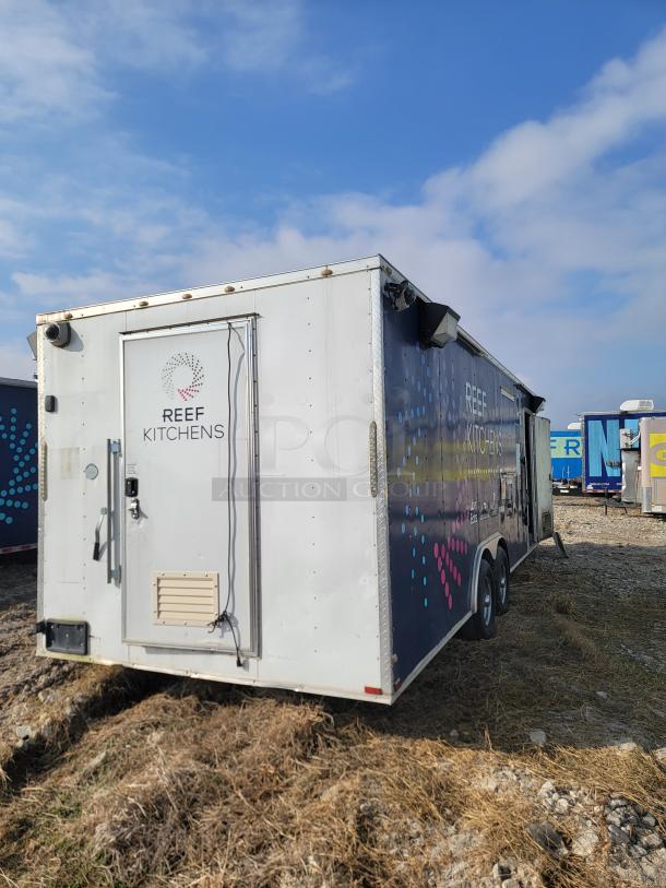 2019 Quality Cargo 24' mobile ghost kitchen trailer with "REEF KITCHENS" branding, requires interior cleaning and exterior TLC.