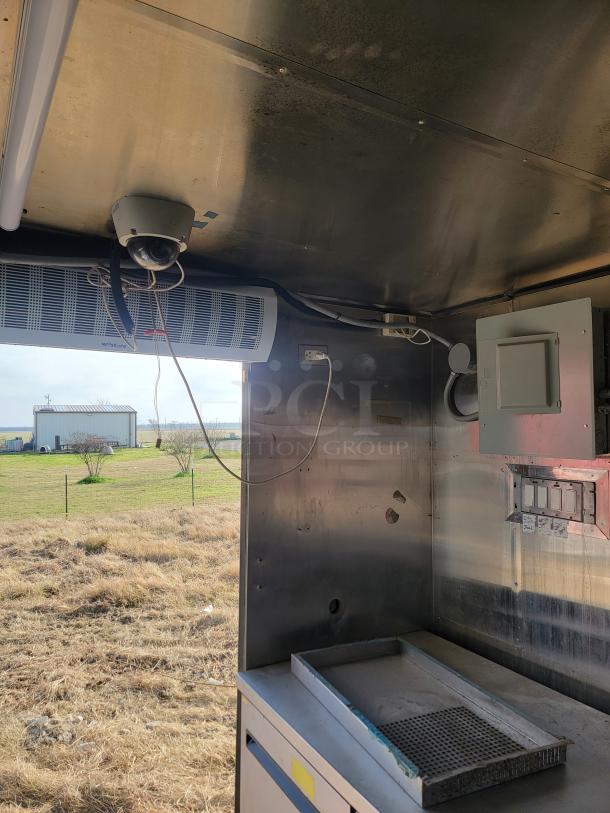 2019 Quality Cargo 24' mobile ghost kitchen interior, showing stainless surfaces and Mirage VentusX HVAC. Needs cleaning.