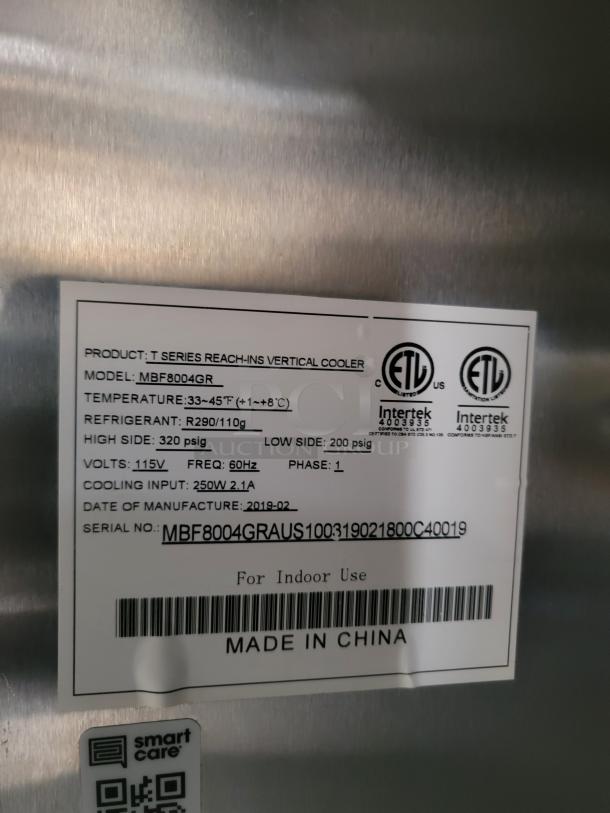 Label on the mobile kitchen shows "T Series Reach-Ins Vertical Cooler," model MBF8004GR, manufactured 2019-02, for indoor use.