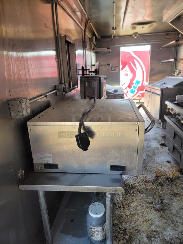 2021 Diamond Cargo 24' mobile kitchen interior with premium Royal cooking suite and Nor-Lake Advantage refrigeration.