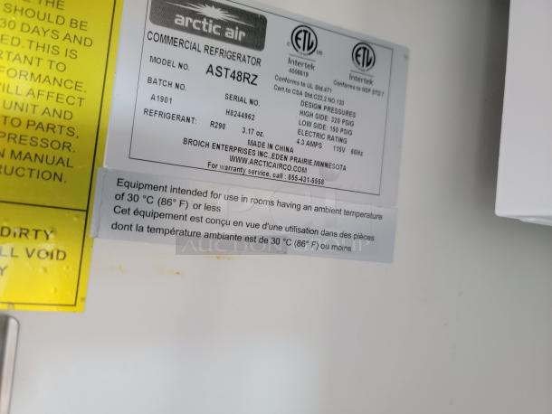 Commercial refrigerator label from an Arctic Air unit in a 2021 Diamond Cargo 24' mobile kitchen. Model: AST48RZ, Serial: H8244962.