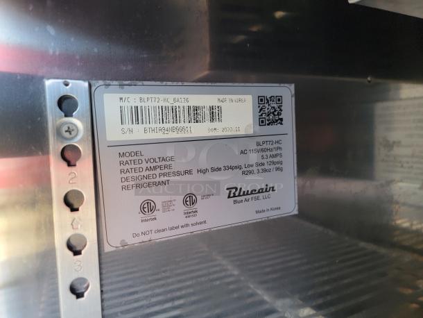 Label on commercial kitchen equipment showing model BLPT72-HC. Indicates voltage 115V, amps 5.3, pressure specs, Blueair brand. Made in Korea.