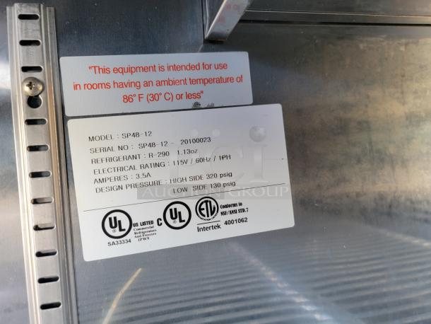Label on refrigeration equipment showing model SP48-12, serial SP48-12-20100023, with UL and Intertek certifications.