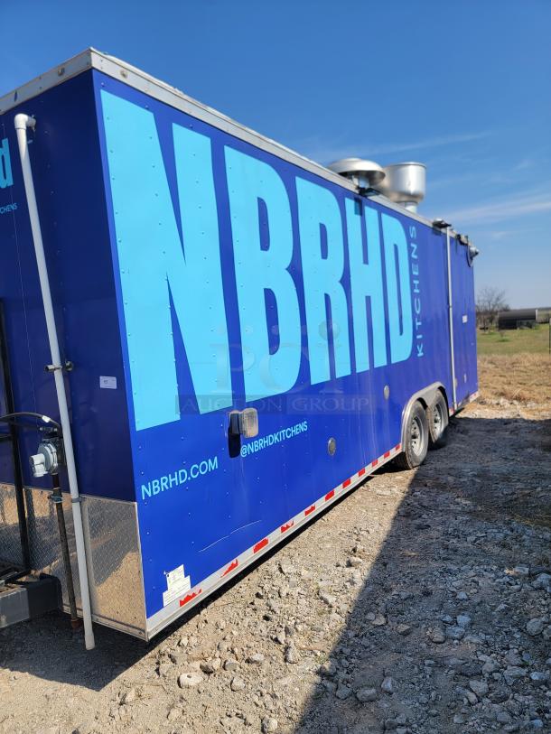 2021 Diamond Cargo 24' mobile kitchen trailer, blue exterior with large "NBRHD" text, equipped with professional cooking line.