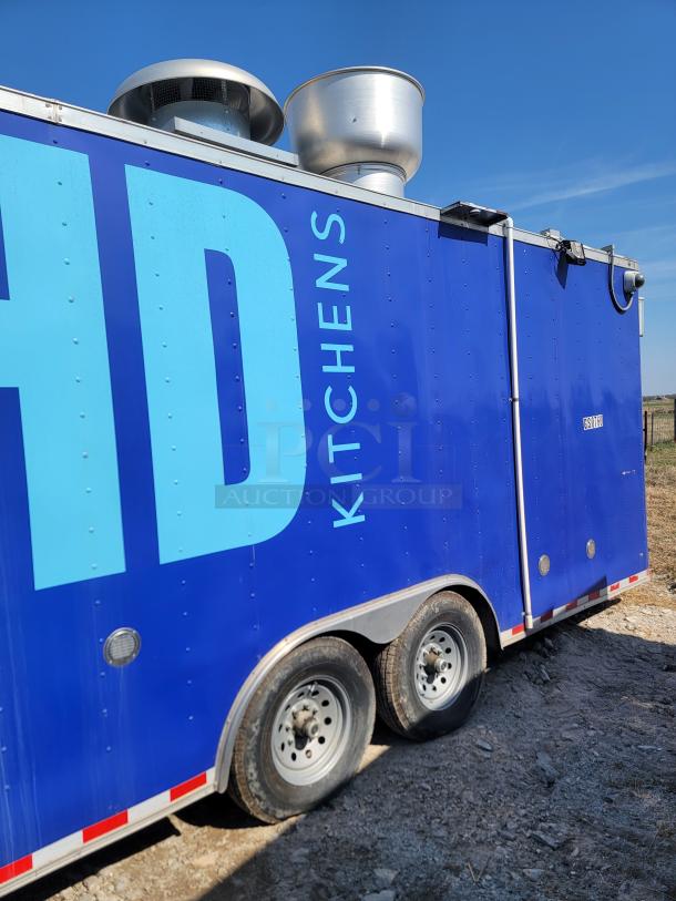 2021 Diamond Cargo 24' mobile kitchen trailer with blue exterior and ventilation system. Ideal for large-scale food service.