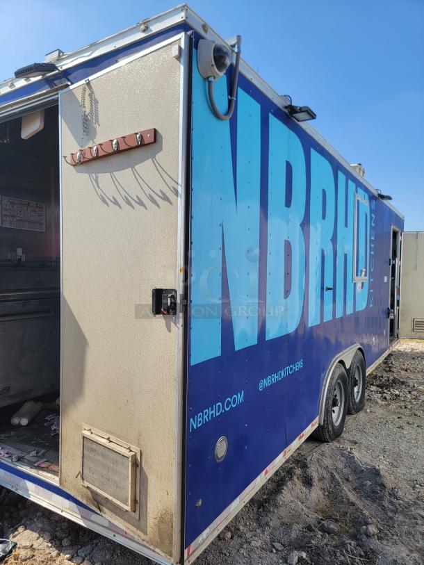 2021 Diamond Cargo 24' mobile kitchen with blue exterior, Southbend cooking line, Arctic Air refrigeration, Avigilon cameras.