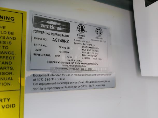 "Arctic Air commercial refrigerator label, model AST48RZ, batch A2011, refrigerant R290, 3.17 oz. For ambient use under 86°F."