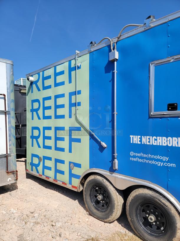2021 Diamond Cargo 24' mobile kitchen trailer, blue/green, dual axle, "REEF" branding. Professional-grade condition.