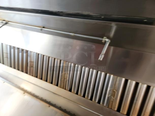 Interior view of 2021 Diamond Cargo mobile kitchen showing industrial CaptiveAire ventilation system in professional-grade condition.