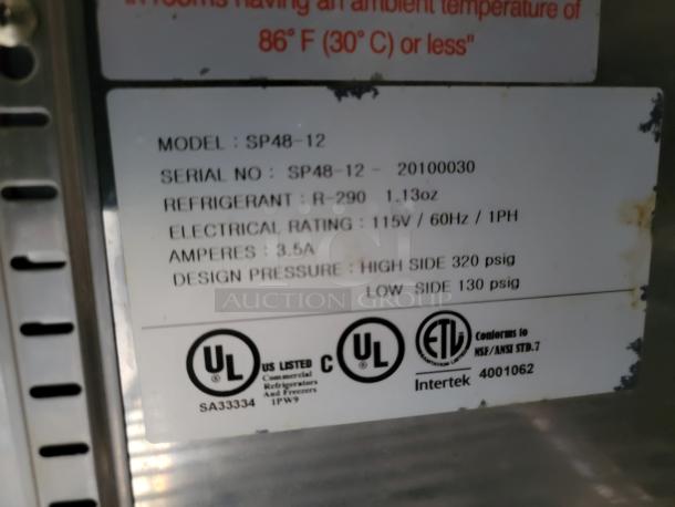 Label showing model SP48-12, serial SP48-12-20100030, refrigerant R-290, electrical rating 115V/60Hz/1PH, UL and ETL certified.