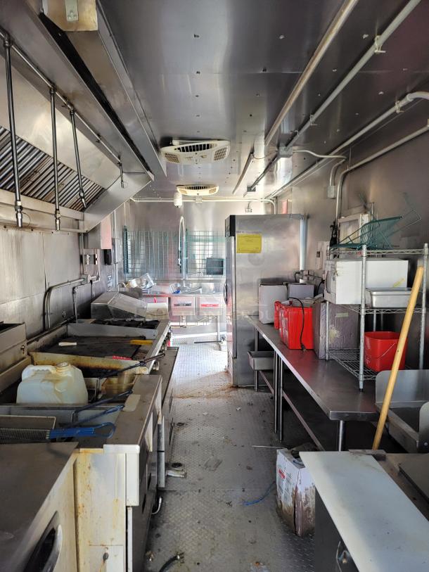2021 Diamond Cargo 24' mobile kitchen interior featuring industrial CaptiveAire ventilation, Mirage Ventus X Mini Split, and Ansul Fire Suppression system.