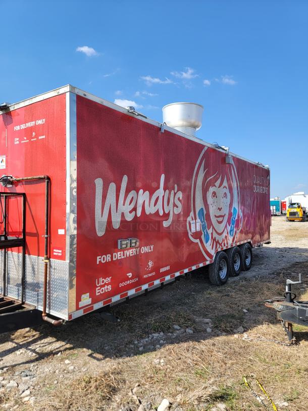 2021 Rock Solid Cargo 28' mobile kitchen trailer, red exterior, triple axle, "For Delivery Only" branding, hardware.