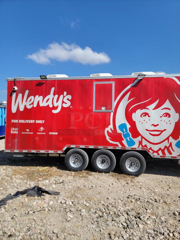 2021 Rock Solid Cargo 28' triple axle mobile kitchen with Wendy's branding, featuring a stable design and high-capacity systems.