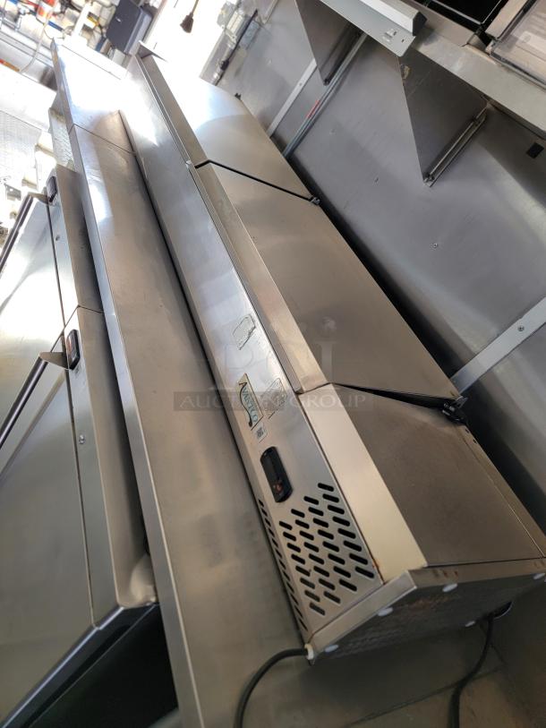 2021 Rock Solid Cargo mobile kitchen interior, featuring stainless steel surfaces and Avantco equipment.