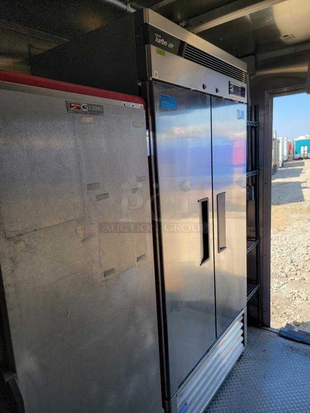 Turbo Air refrigerator and Metro C5 Series insulated cabinet inside the 2021 Rock Solid Cargo 28' mobile kitchen.