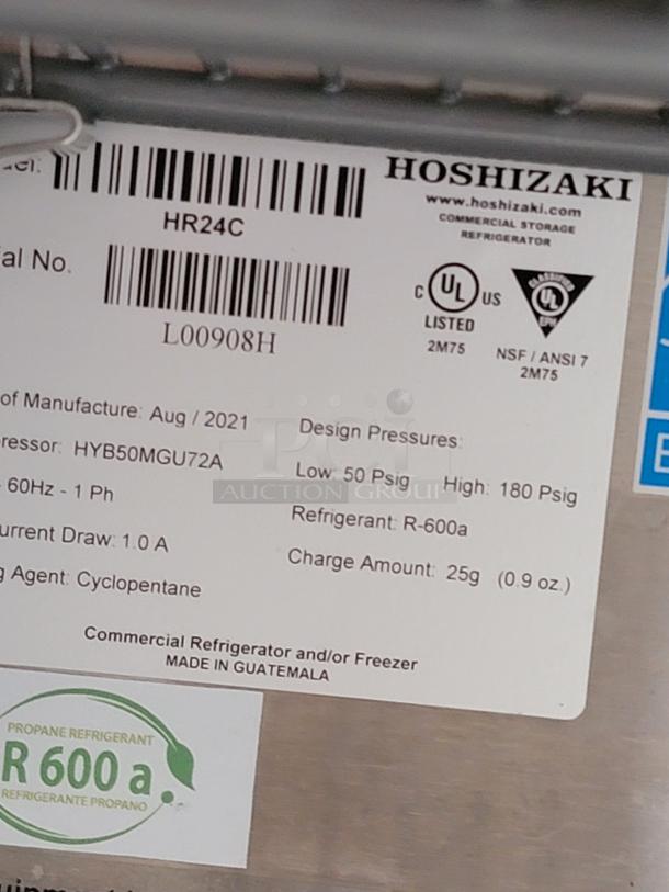 Label on Hoshizaki HR24C refrigerator showing model info, refrigerant R-600a, charge amount 25g, made in Guatemala.