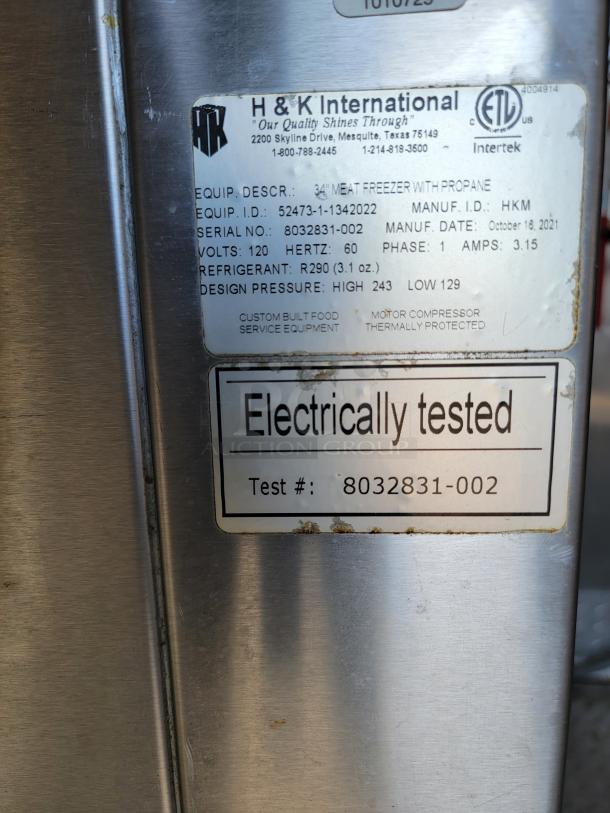 Label on H&K International 34" meat freezer with propane. Serial No: 8032831-002. Electrically tested.