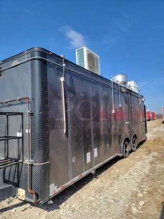 2020 Diamond Cargo 28' food trailer, black, dual axle, equipped with Black Diamond cooking gear, Arctic Air refrigeration.