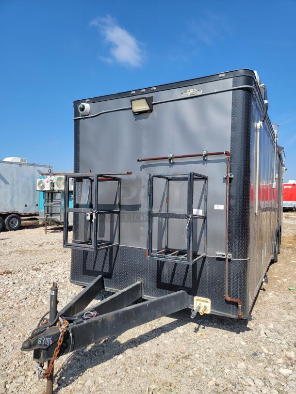 2020 Diamond Cargo 28' food trailer with 5200 LB dual axle. Features include Black Diamond cooking gear, Arctic Air refrigeration, and Mitsubishi climate control. VIN: 53NBE2824L1083186.