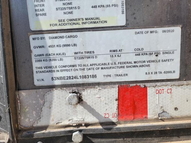 2020 Diamond Cargo food trailer VIN plate showing specifications and compliance details, model 28, with 5200 LB GAWR.