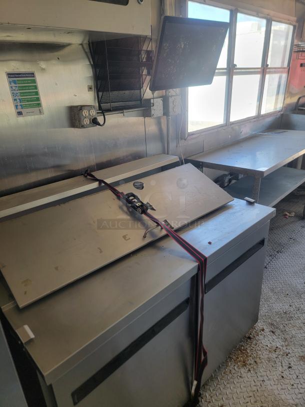 2020 Diamond Cargo 28' food trailer interior, featuring Black Diamond cooking gear and Arctic Air refrigeration. Good condition.