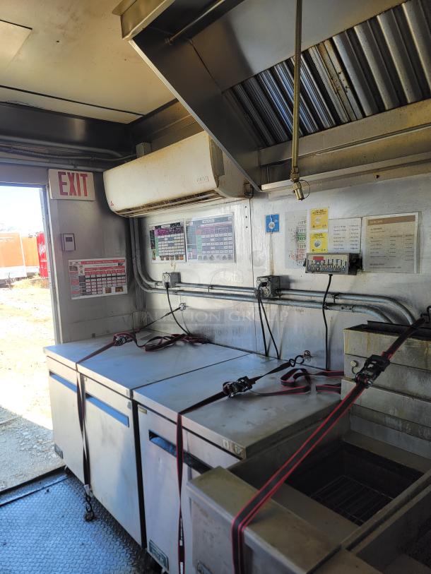 2020 Diamond Cargo 8.5 x 28 food trailer interior with Black Diamond cooking equipment and Arctic Air refrigeration. Dual axle setup.