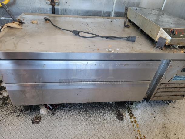 Rusted Arctic Air refrigeration unit in a Diamond Cargo food trailer, showing signs of wear with visible dirt and grime.