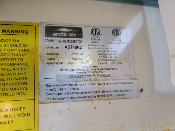 Arctic Air commercial refrigerator label showing model AST48RZ, batch A2009, serial H20082072, and design pressures.