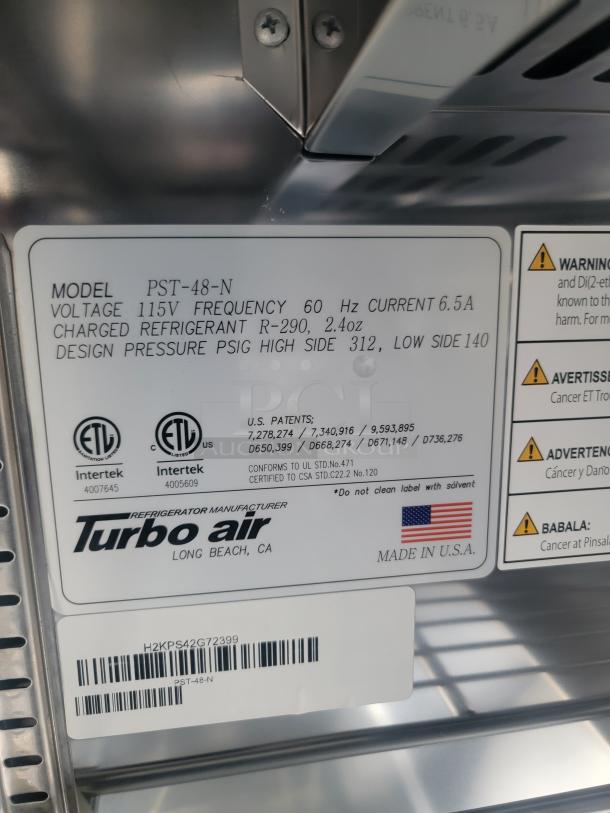 Label on Turbo Air refrigeration unit showing model PST-48-N, 115V, R-290 refrigerant, ETL certified, made in USA.