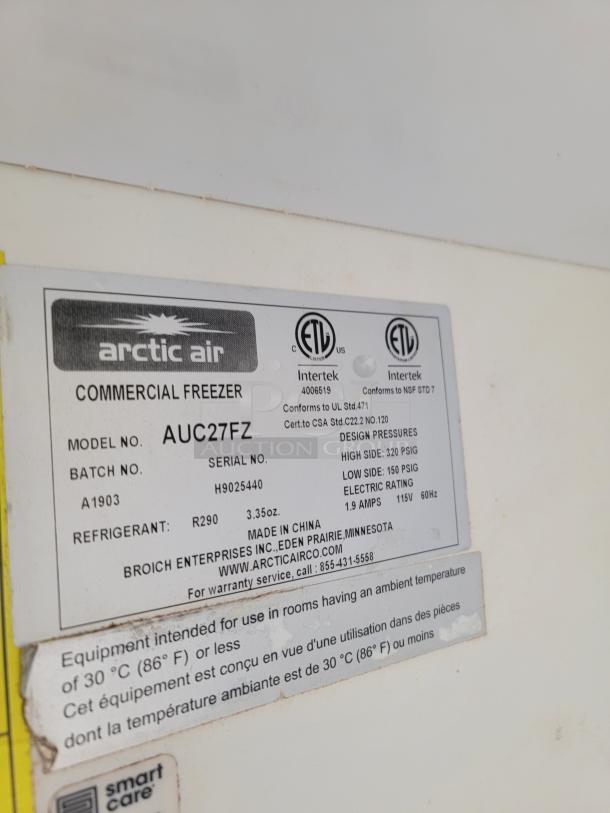 Arctic Air commercial freezer, model AUC27FZ, serial H9025440, uses R290 refrigerant, made in China, ETL certified.