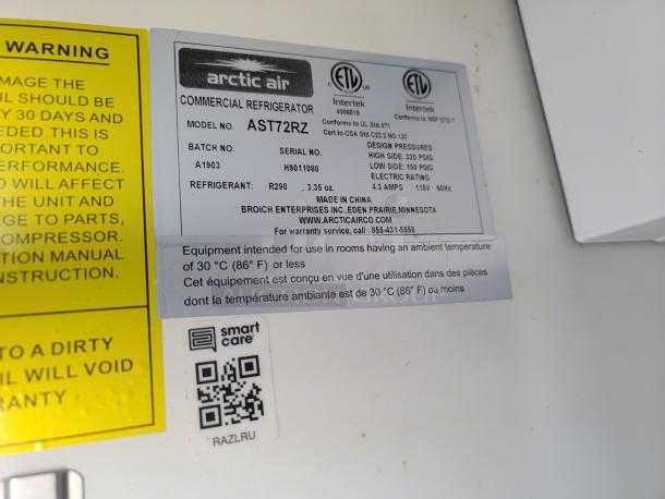 Arctic Air commercial refrigerator label, Model AST72RZ, serial HR9011080, uses R290 refrigerant, 115V, 4.3 amps.