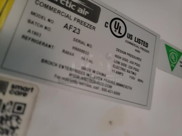 Arctic Air Commercial Freezer label, Model AF23, UL listed, refrigerant R-404A, design pressures 430/220 PSIG.