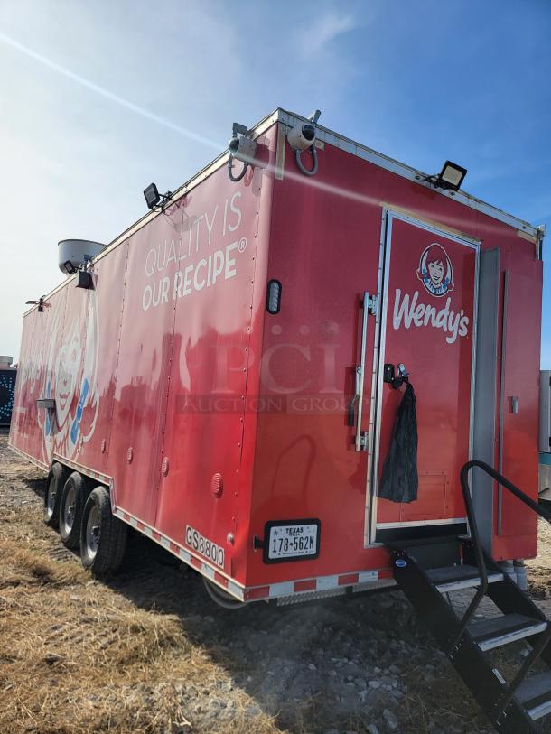 Red Wendy's food truck with branding and logo, door open with steps, license plate visible, GS8800 marking, in good condition.