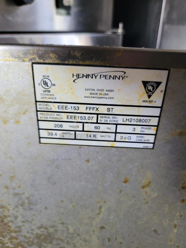 Henny Penny EEE-153 model label showing product and serial number, voltage, amperage, watts, and wire details.