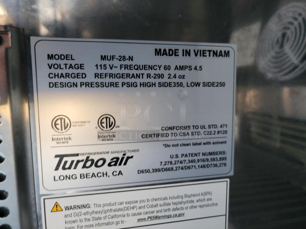 Turbo Air MUF-28-N freezer label showing model, 115V, 60Hz, refrigerant R-290 details, and safety warnings. Made in Vietnam.