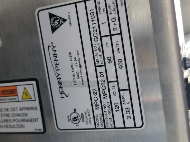 Henny Penny MPC-22 appliance label showing model, serial number GC2111031, 120 volts, 400 watts, in good condition.