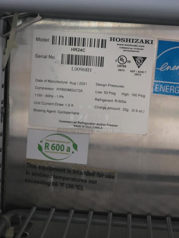 Hoshizaki HR24C commercial refrigerator label, model and serial numbers, compressor details, R-600a refrigerant. Made in Guatemala.