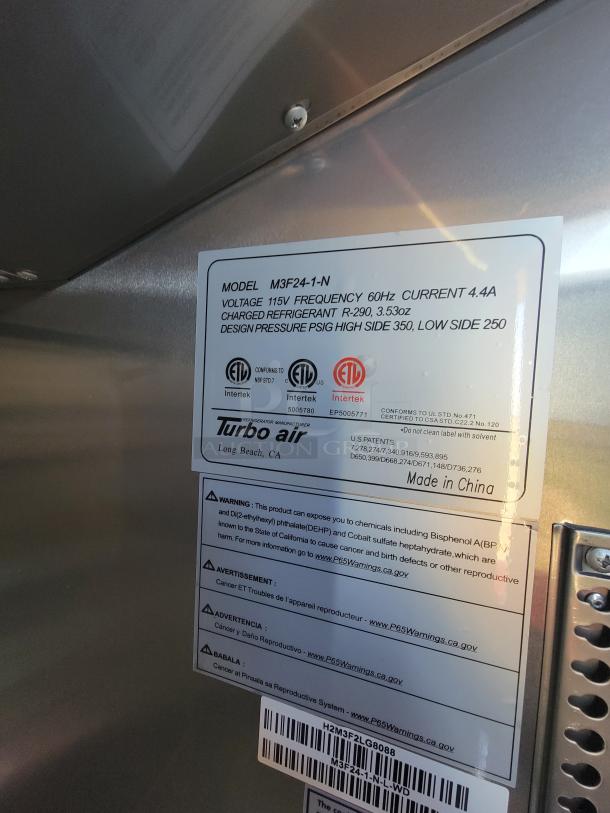 Turbo Air refrigerator model M3F24-1-N label; 115V, 60Hz, R-290 refrigerant; warning for chemical exposure; Made in China.