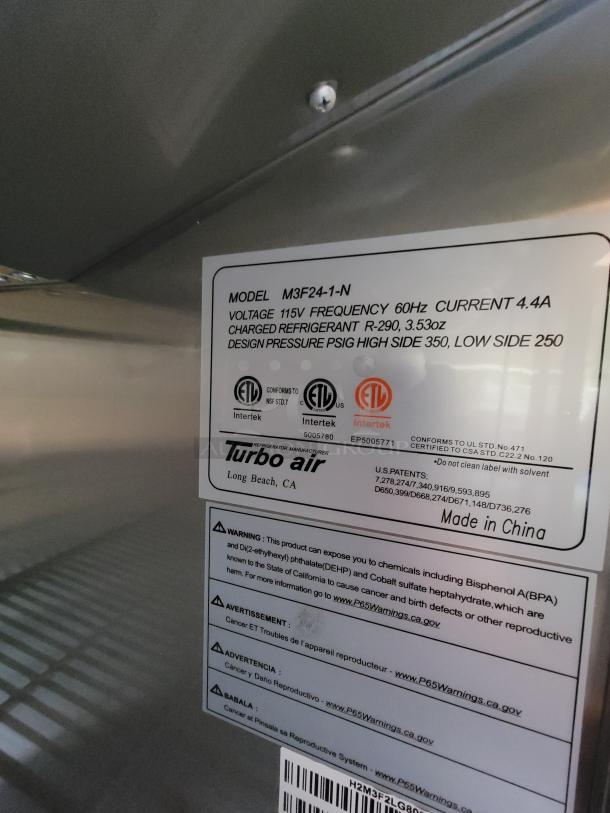 Turbo Air refrigerator, Model M3F24-1-N, 115V, 60Hz, R-290 refrigerant, ETL certified, warning labels included.