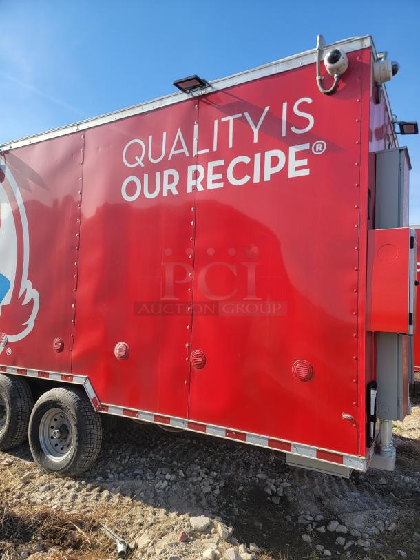Red mobile food truck with text "QUALITY IS OUR RECIPE" on the side, featuring a dual axle and mounted security cameras.